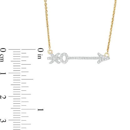 0.17 CT. T.W. Natural Diamond XO" Arrow Necklace in 10K Yellow Gold"