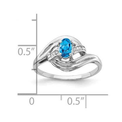 Solid 14k White Gold 5x3mm Oval Simulated Blue Topaz A CZ Ring