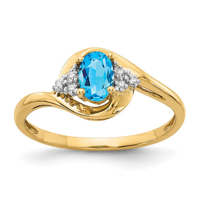 Solid 14k Yellow Gold Simulated Blue Topaz and CZ Ring