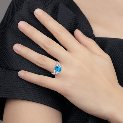 14k White Gold 10x8mm Oval Blue Topaz Checker VS Diamond ring