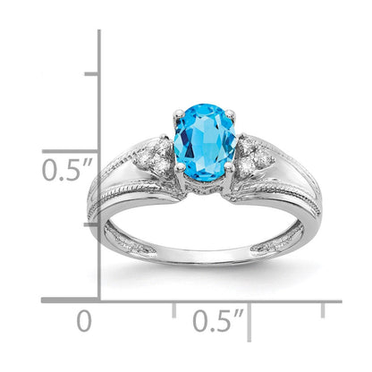 14k White Gold 7x5mm Oval Blue Topaz A Real Diamond ring