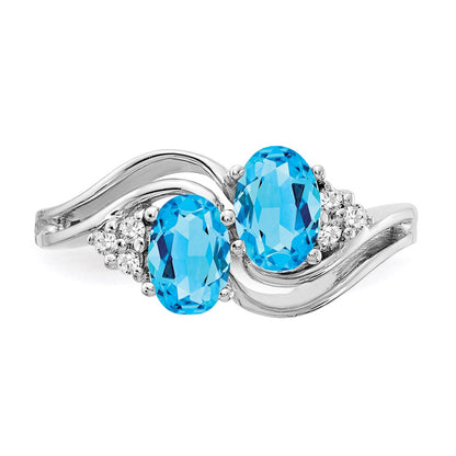 14k White Gold 6x4mm Oval Blue Topaz A Real Diamond ring