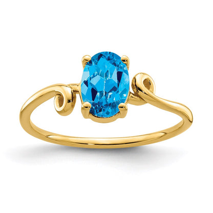 14K Yellow Gold 7x5mm Oval Blue Topaz ring